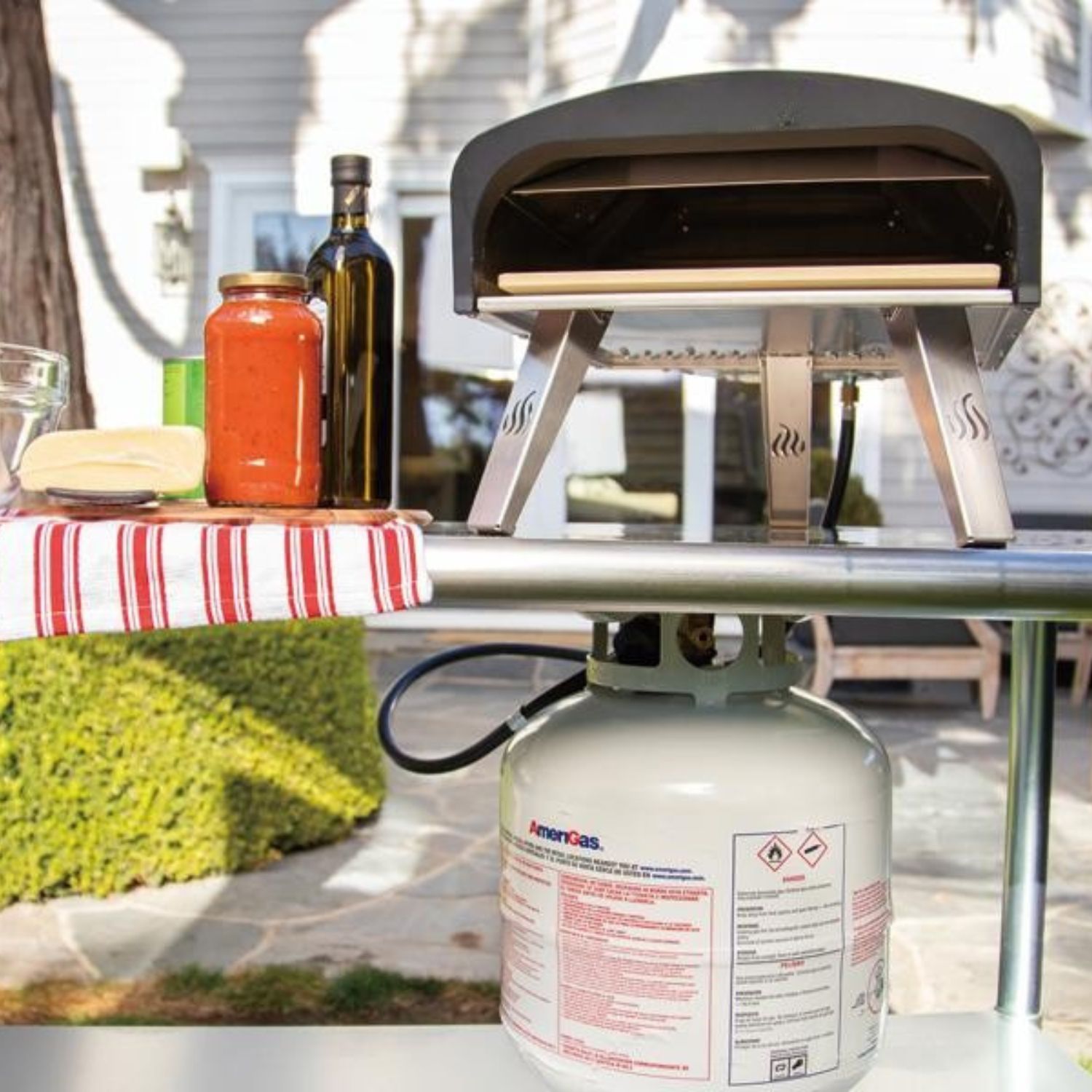 Pizza on peel outdoor gas oven